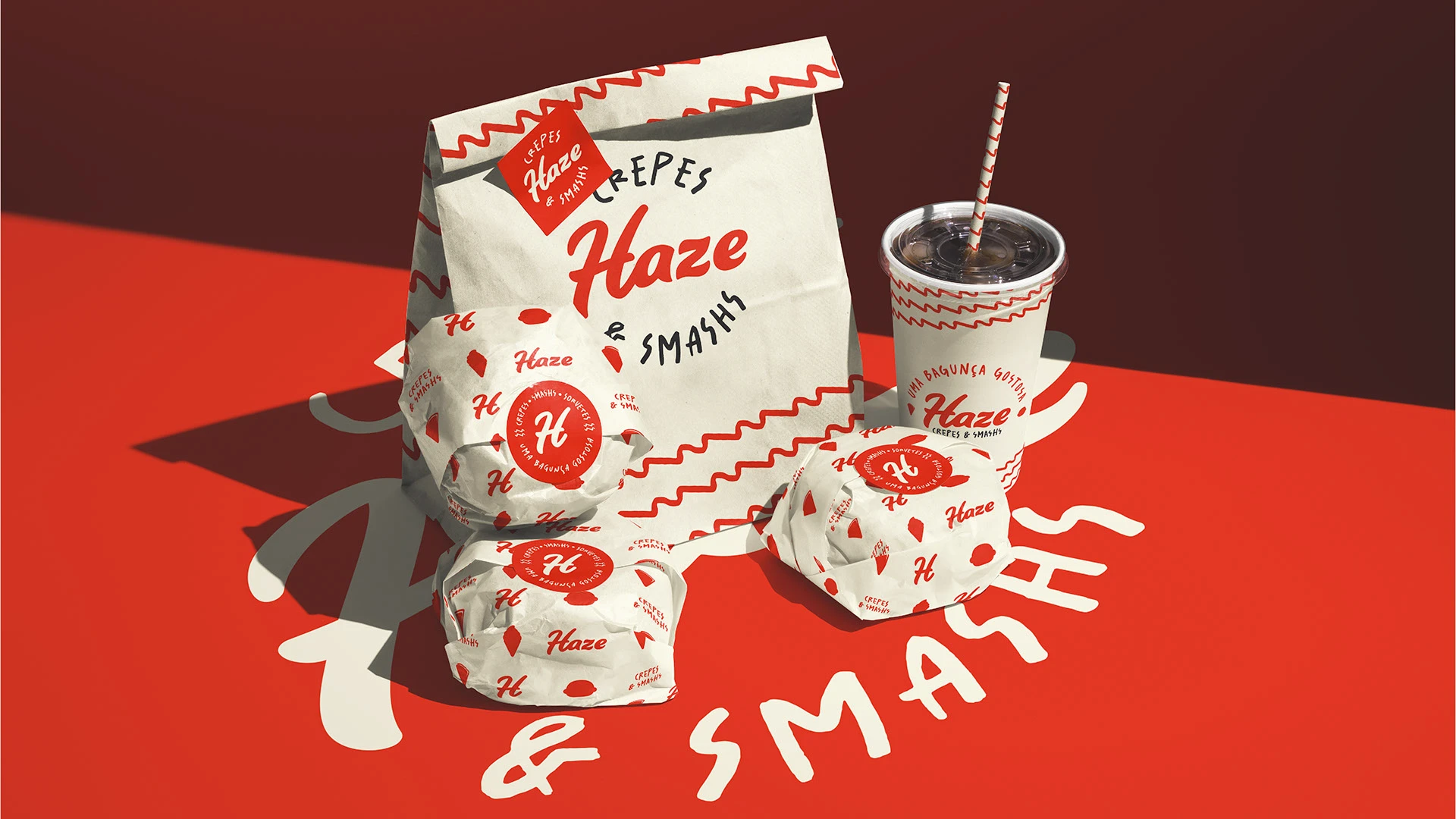 Identidad Haze en bolsa vaso y envases con rojo crema y negro